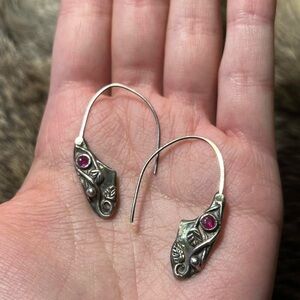 Silver toned boho whimsical side-hoop earrings with man made ruby